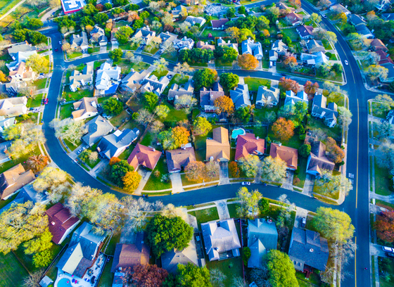 Colorful Fall Aerial Homes in Modern Suburb