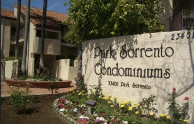 Exterior entrance sign and landscaping at Park Sorrento Condominiums in Calabasas, California
