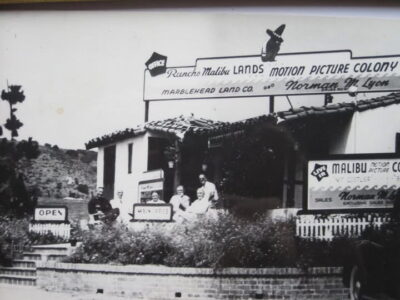 Historic photo of Norman M. Lyon and colleagues outside the Marblehead Land Co. Rancho Malibu office, representing the Lyon family’s early role in Malibu real estate development.