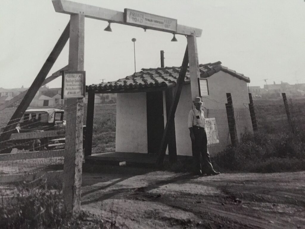 Historic Malibu Colony gate black-and-white photo from early Malibu community.