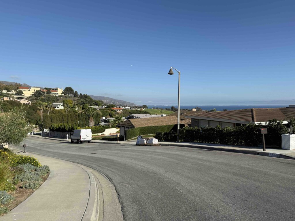 Residential street with ocean views in Malibu Country Estates above Pacific Coast Highway