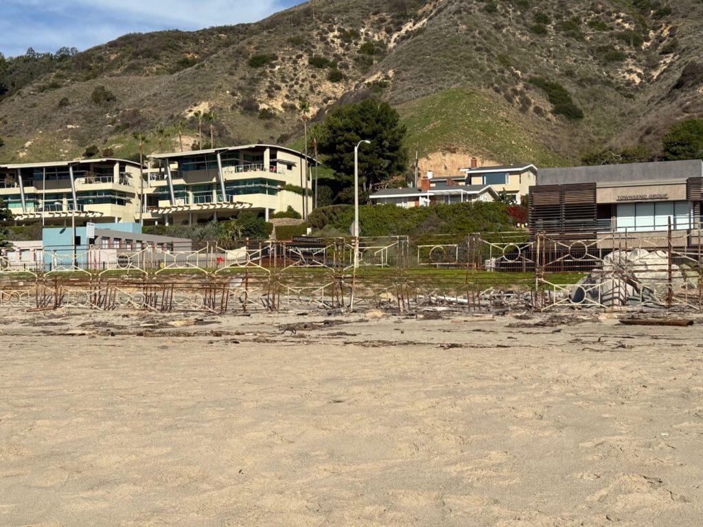 Malibu homes showing oceanfront properties near the beach contrasted with hillside homes set farther back from coastal exposure.