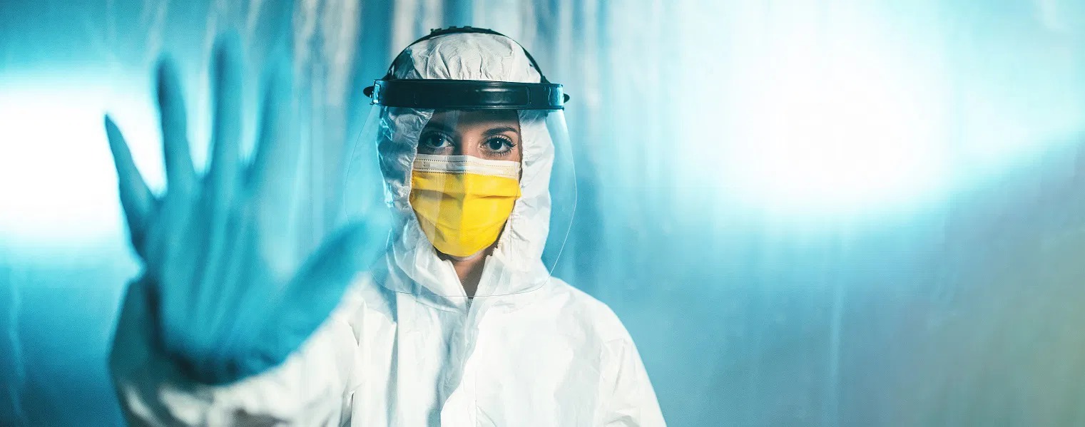 female doctor with covid suit