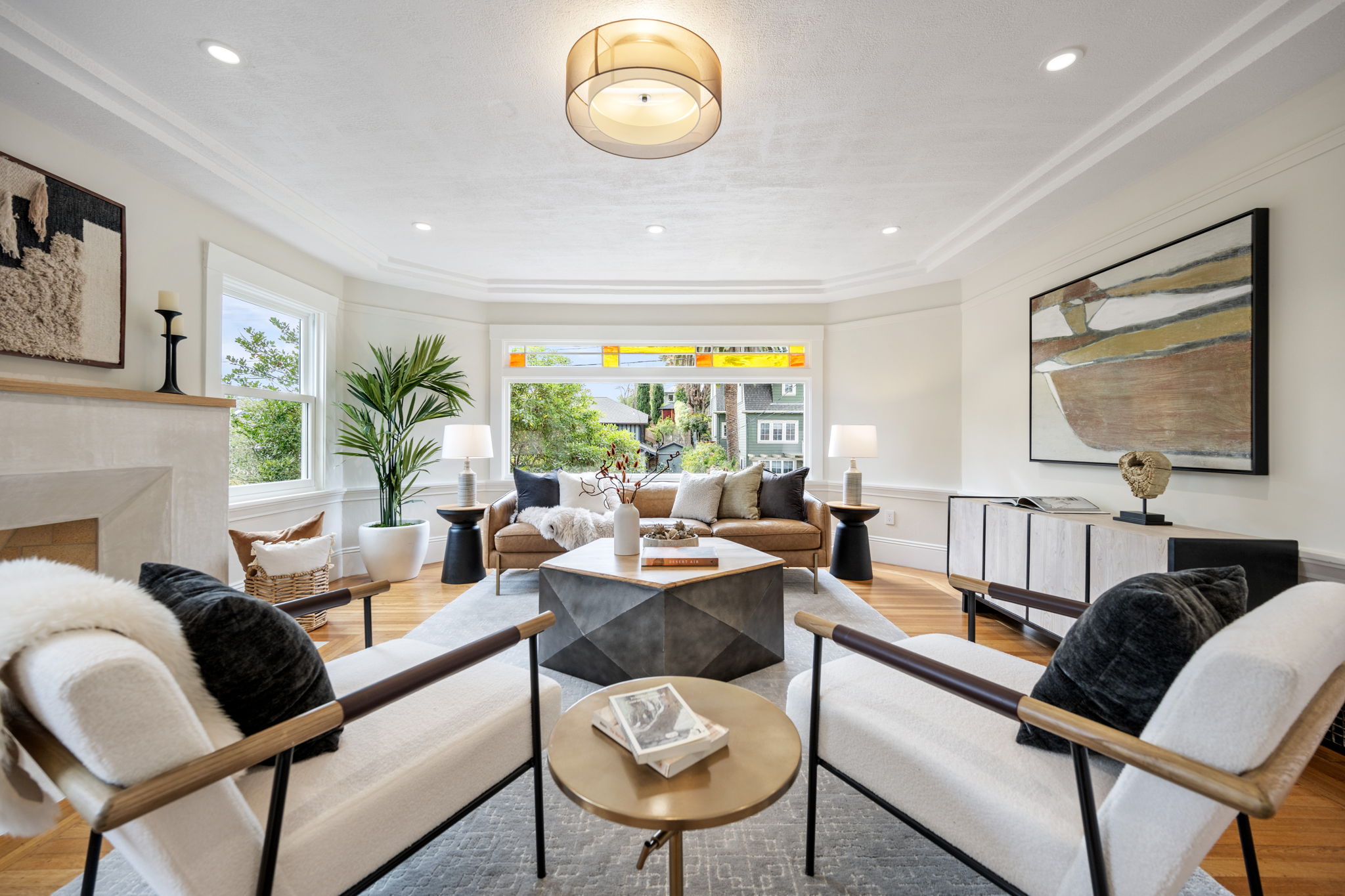 Stunning living room anchored by fireplace