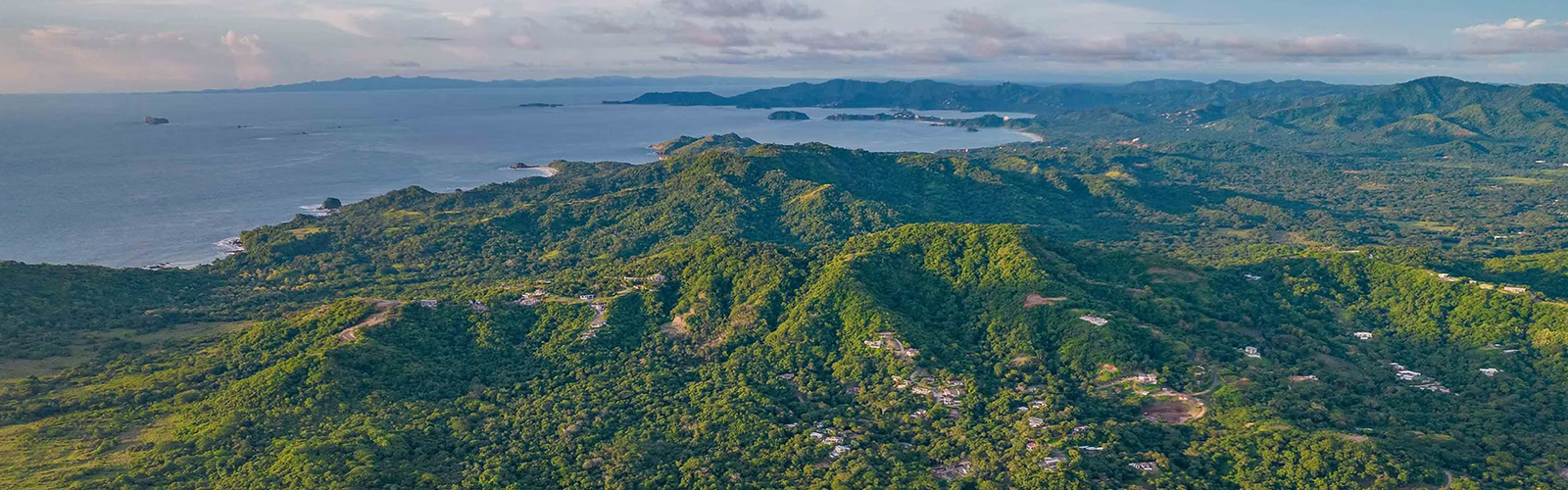 Aerial view of Las Ventanas community with ocean and forest views in Playa Grande, Costa Rica