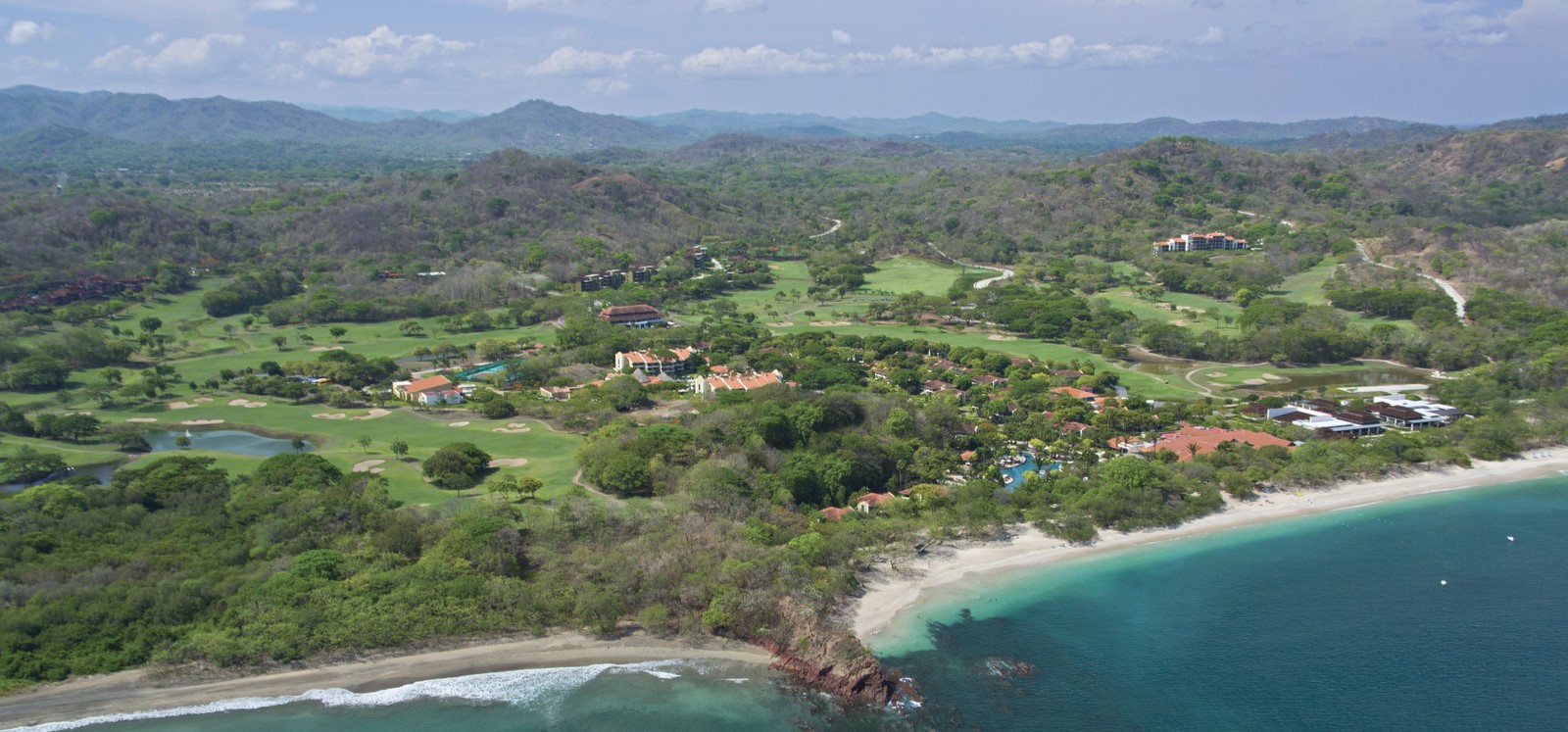 Aerial view of Reserva Conchal luxury community overlooking Playa Conchal beach in Costa Rica