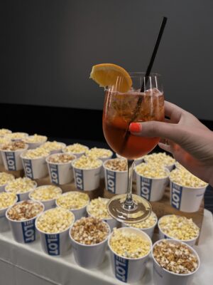 Photo of aperol spritz and popcorn