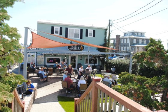 Charming waterfront view of Swansboro with historic buildings and boats