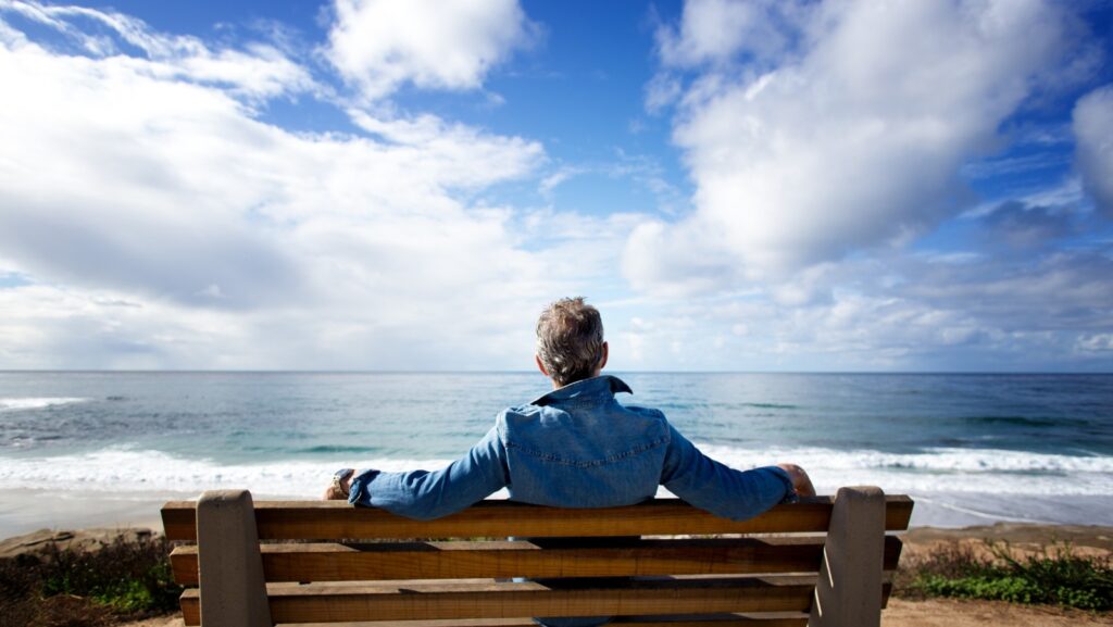 Man Sitting on Bench