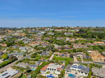 Aerial view of La Jolla little coastline city with nice beautiful wealthy villas with swimming pool. La Jolla, San Diego, California, USA. West coast real estate development.