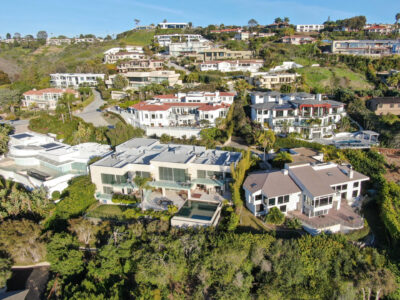 Aerial view of La Jolla little coastline city with nice beautiful wealthy villas with swimming pool. La Jolla, San Diego, California, USA. West coast real estate development.
