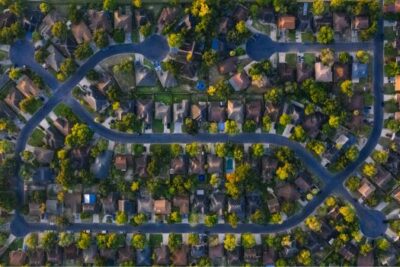 Aerial view of a suburban neighborhood representing U.S. housing affordability and homeownership trends in 2025.
