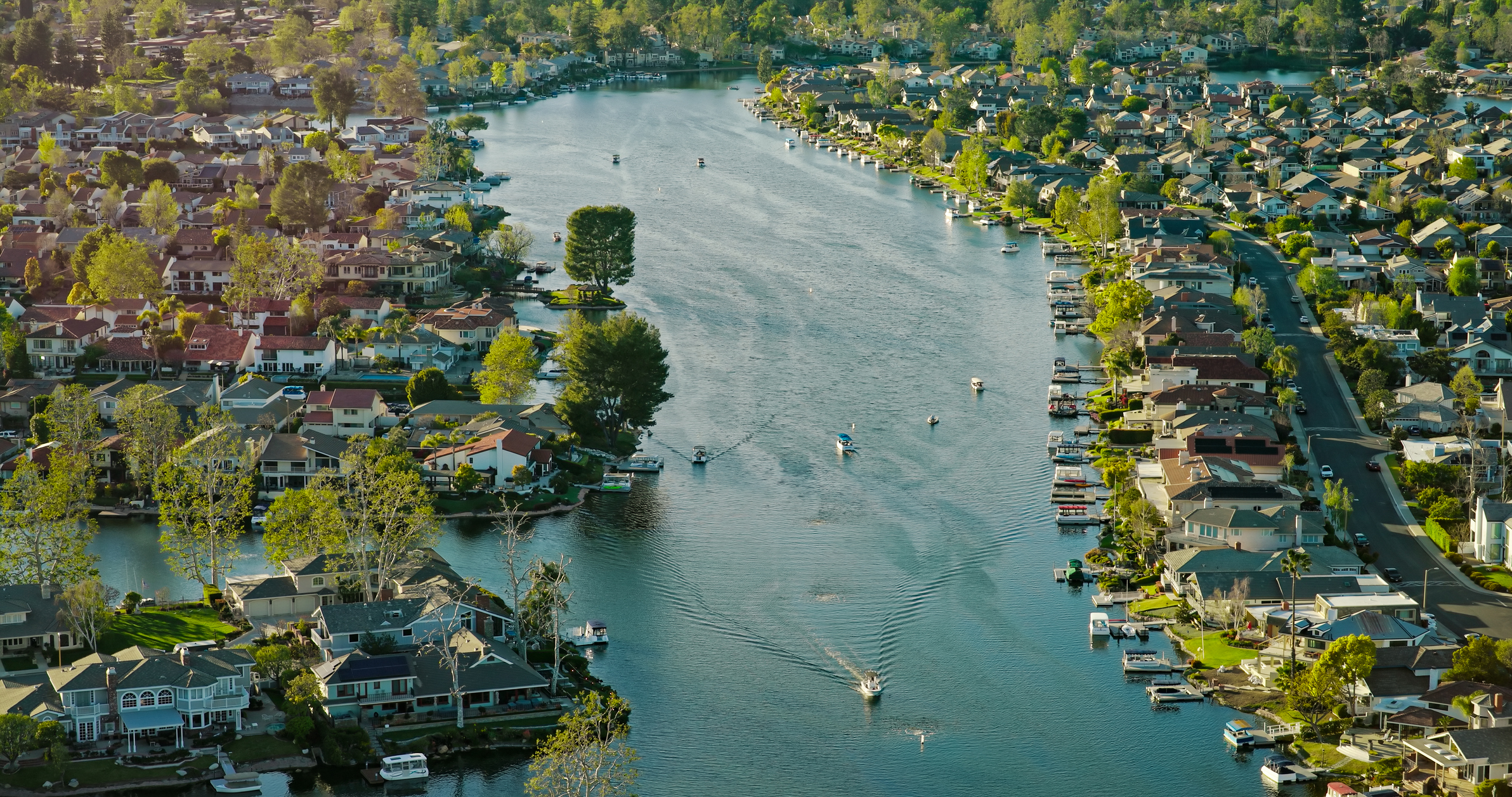 High Angle Drone Shot of Boats on Westlake Lake in Westlake Village, CA at Sunset
